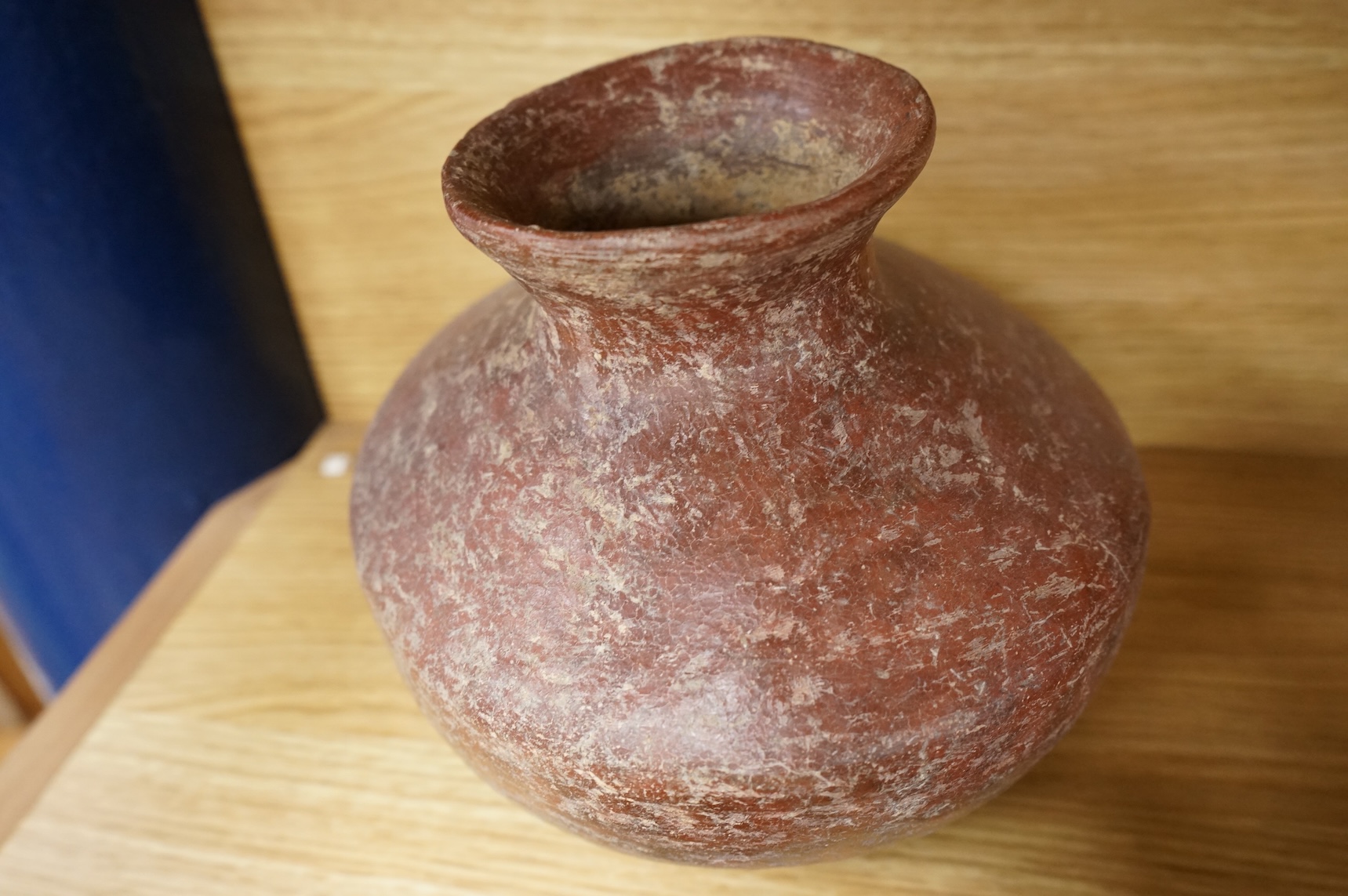 A collection of various South American vessels some in the form of grotesque heads, largest 24cm wide